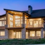 Custom home exterior photo at sunset.